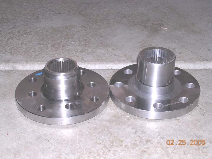 Im using WFO flange (on left and 1/2" shorter) in the rear, and a Highangle flange(on right) in the front for extra xmember clearance