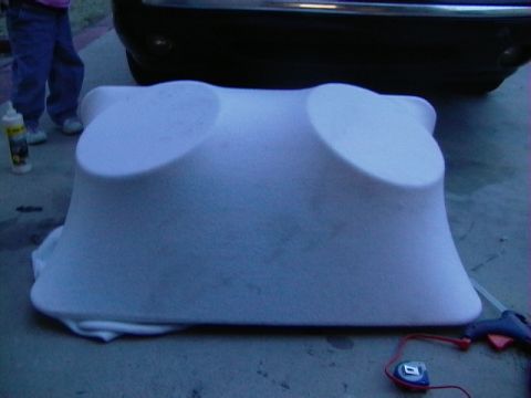 1999 Ford Taurus - A custom fiberglass mold is shown on the ground, with a portion of a vehicle visible in the background.