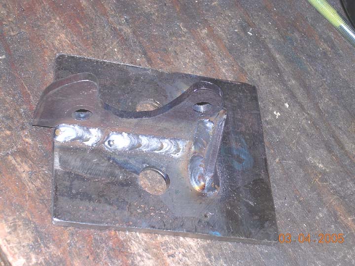 bracket welded up with a small gusset plate.  It was recommended that the sticks get some force against them when the tcase binds up.  This should hold, its welded ALOT