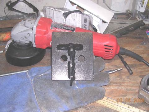 1994 Ford Bronco - bracket finished and painted. ready for install. The grinder gives an idea of how large the bracket is.