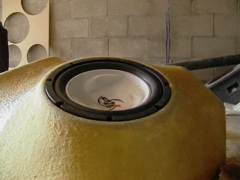 1999 Ford Taurus - Custom subwoofer enclosure with a speaker, possibly for a car audio installation.