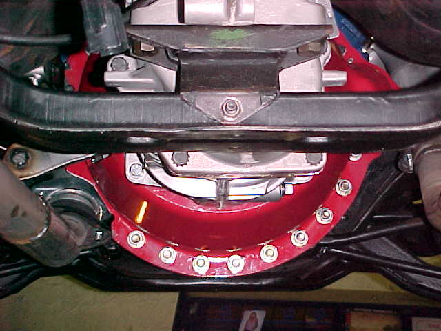 The original C6 trans mount & the original cross member, fit without modification on the Tremec.