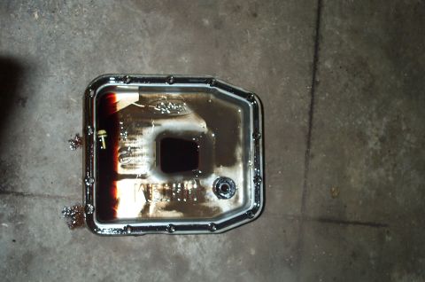 1998 Ford Crown Victoria - The trans pan w/it's overdue-for-a-flush-fluid.