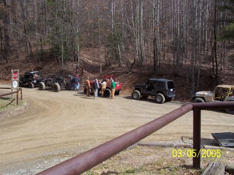 1979 Ford F-150 - A group of off-road vehicles are gathered on a dirt road, with a date stamp of 03/05/2005 visible.