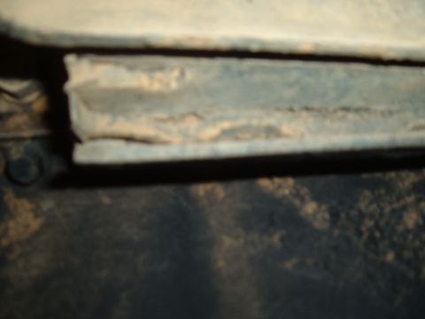 1978 Ford Bronco - A detailed view of a weathered metal component, showing signs of age and exposure.
