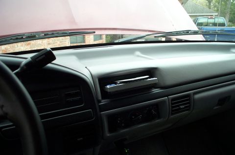 1996 Ford Bronco - Interior view of a 1996 Ford Bronco, the dashboard and an aftermarket stereo unit.