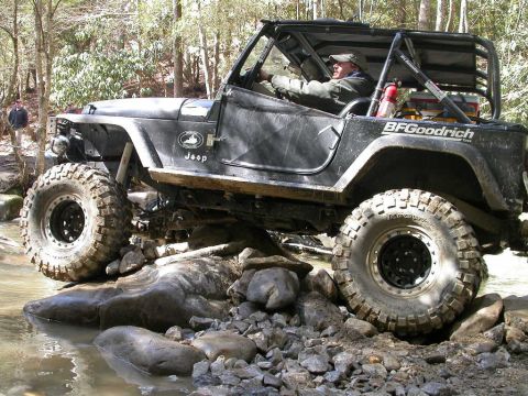 1990 Ford Bronco - Gotta hate being high-centered on your tranny, in the creek.