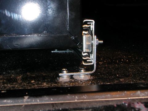 1984 Ford Bronco - mount to the floor using #10 coarse thread metal screws & L-brackets. use washers for proper spacing and elevation so as to clear tailgate.