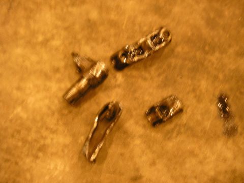 1990 Ford Probe - A set of car keys lies on a textured surface, suggesting a moment of transition or pause.