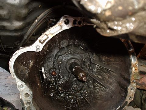 1986 Toyota Pickup/SR5 - this is the inside of the bellhousing, I didnt photograph it after i cleaned it or after i had taken off the baring cover. what had happene…