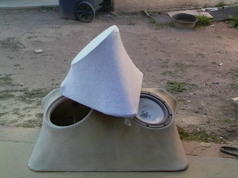1999 Ford Taurus - This is a custom car subwoofer enclosure with two speaker cutouts, one speaker installed.