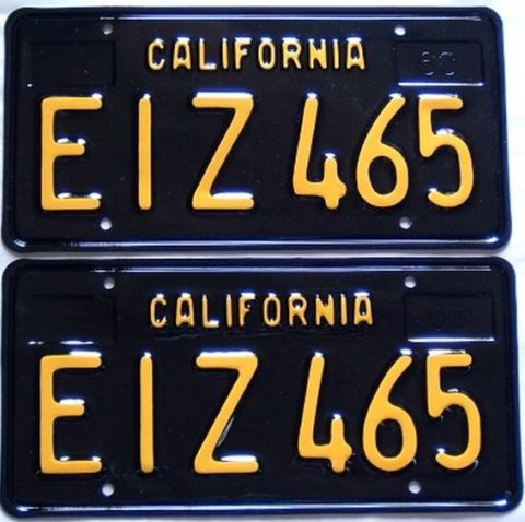 2002 Ford Mustang - A pair of California license plates with the same alphanumeric combination are displayed.