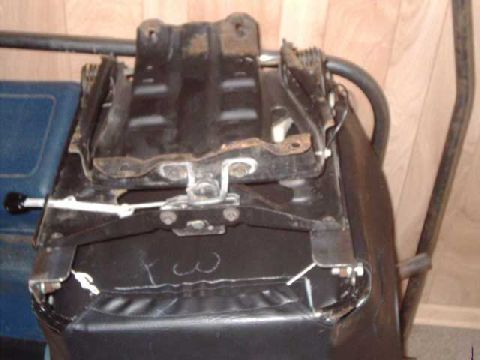 1984 Ford Bronco - passngr-side seat bracket mounted to prp seat. This retains the flip-up feature.