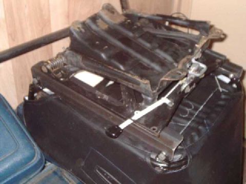 1984 Ford Bronco - Another view of the factory passngr-side seat mounting bracket bolted to the prp seat. angle iron notched for spring end sticking up near f…