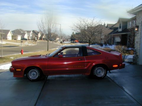 1978 Ford Mustang II - This 1978 Ford Mustang II King Cobra is seen in a suburban driveway on a clear day.