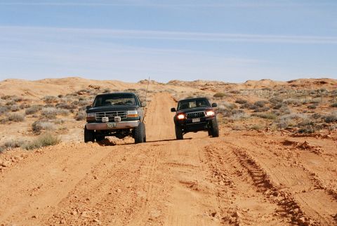 1996 Ford Bronco - My Bronco on the left, Eric Huml's Taco on right. Little size difference eh?