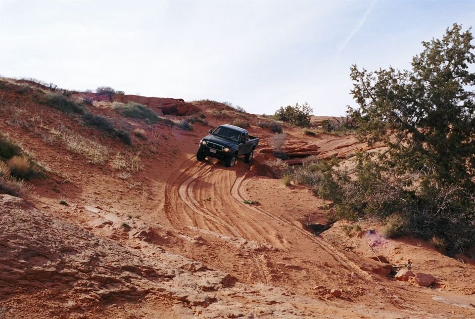 I was first down this sandy wash.  Notice my tire tracks, thought I was going to flop over into the gulley.  It was raining on and off and the sand was a little goosey.