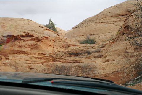 1996 Ford Bronco - Wish I got a better picture of this steep climb. It's about a 5 foot verticle with ledges after it. I shot this looking straight out the dr…