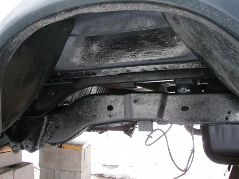 1994 Ford Bronco - Undercarriage view showing frame and suspension components, likely a part of a larger vehicle.