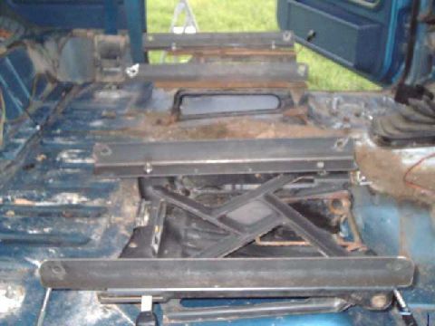 1984 Ford Bronco - passngr-side view of angle iron mounted to factory seat brackets.