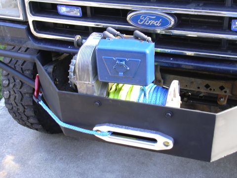 1991 Ford Bronco - Front view of a 1991 Ford Bronco showing the bumper, winch, and Ford grille emblem.