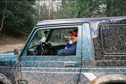 1990 Ford Bronco - Suzuki guy with yip-yip dog in sweater.