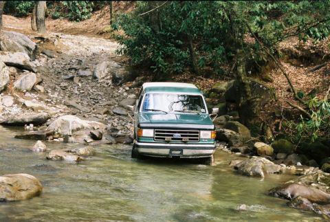 1990 Ford Bronco - Into the creek.