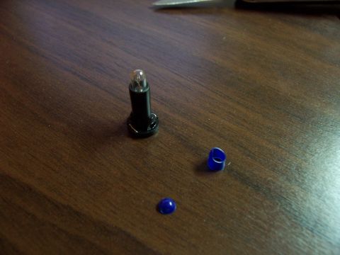 1999 Ford Taurus - bulb with cover off, i ripped mine.