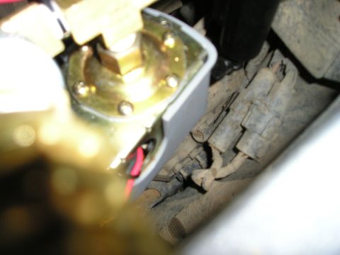 1996 Ford Bronco - This image shows a close-up view of a vehicle's electrical component, likely part of an air system.