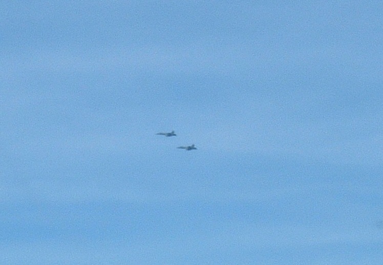 So its me and pete left on this trip, the other guys went back to Daytona for work and stuff. Us slackers head off to Charlotte. On the way we get a traffic call "N139ER traffic 1-2 o-clock 10,000 feet fast moving 2 F-18's." Gluing our eyes to the 1-2 o clock position we find "Viper 21" formation. I wish my callsign was Viper 21.