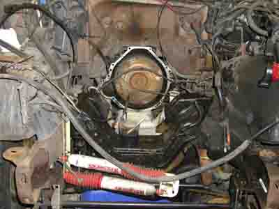 1988 Ford Bronco - The engine bay shows the transmission bell housing and surrounding components.