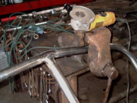 1984 Ford Bronco - Finished the welds with a grinder, then shot some grey primer on the seams.