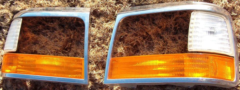 Headlight doors  from '96 EB Bronco.  No chips, scratches, cracks, or other damage.