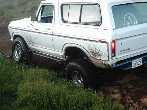 1978 Ford Bronco - This 1978 Ford Bronco is navigating a muddy, off-road trail.