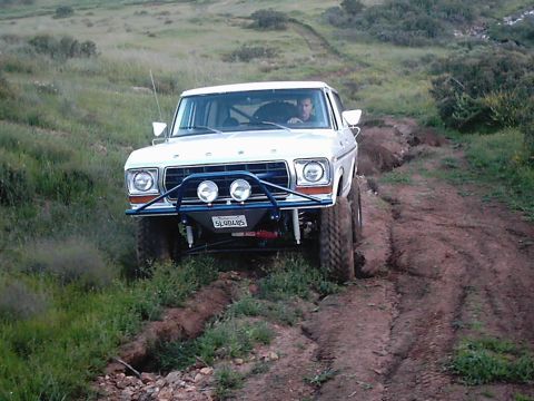 1978 Ford Bronco - This 1978 Ford Bronco navigates a challenging off-road trail, its capabilities.