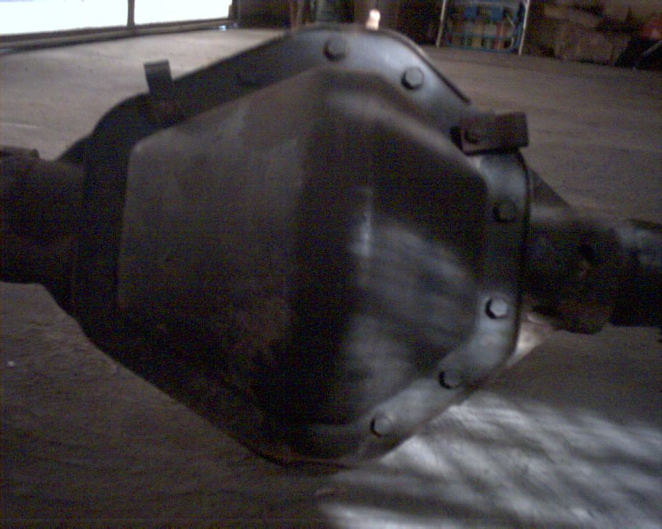 Dark differential housing with bolted cover and axle tubes