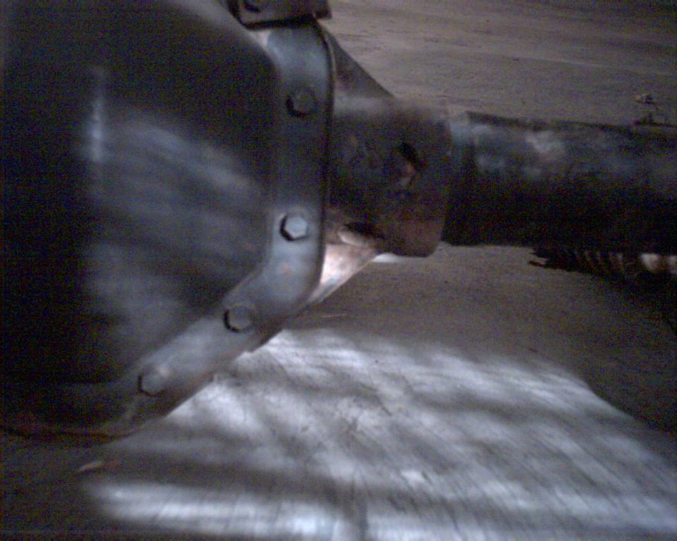Rear axle differential housing with 14 bolts visible