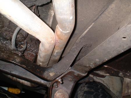 1978 Ford Bronco - Undercarriage view shows exhaust system and frame. Supermotors.net watermark is present.