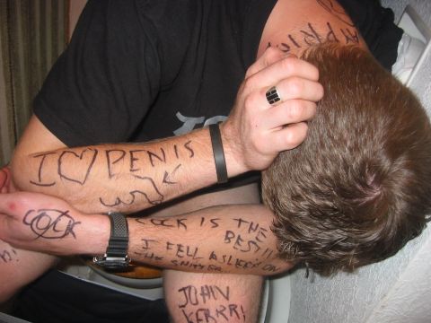 1989 Ford Bronco - Handwritten messages and drawings are visible on a person's arms.