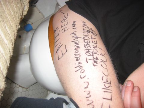 1989 Ford Bronco - A toilet is visible with writing on a person's leg.