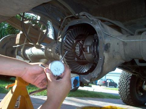 1988 Ford Bronco - Measuring the backlash on a vehicle's differential gears with a dial indicator.