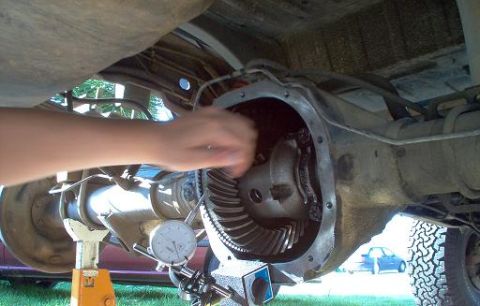 1988 Ford Bronco - Setting up differential gears with a dial indicator, likely for a vehicle repair or upgrade.