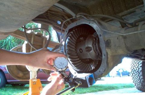 1988 Ford Bronco - Measuring differential gear backlash with a dial indicator.