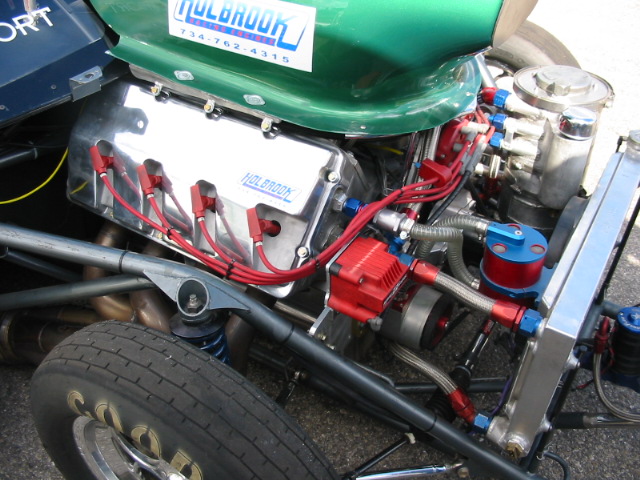 Engine bay with Holbrook valve covers and a green body panel