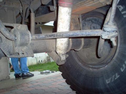 1988 Ford Bronco - Rear suspension and tire detail, likely from a truck or SUV.