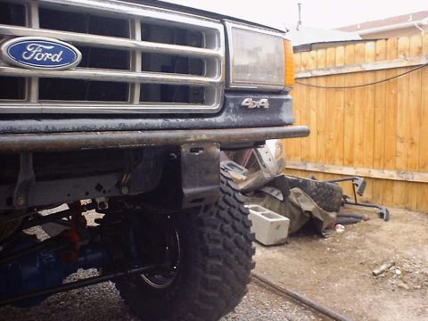 1988 Ford Bronco - Front view of a Ford truck, likely from the late 1980s, with a custom bumper installed.