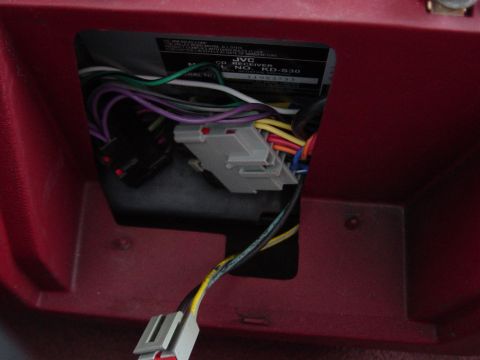 1988 Ford Bronco - The empty spot where the ashtray was. I had to remove most of the back panel to get it to mount properly.. There's a small lip on the botto…