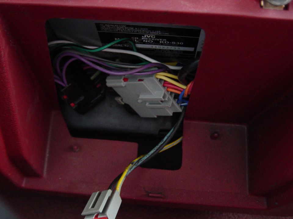 The empty spot where the ashtray was.  I had to remove most of the back panel to get it to mount properly..  There's a small lip on the bottom that you need to leave.