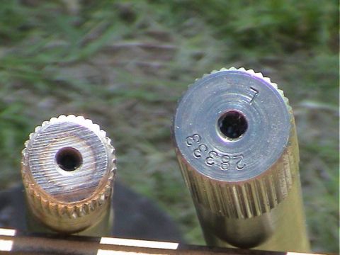 1979 Ford Bronco - Close-up view of two metal components, one stamped numbers '28333' and a letter 'F'.