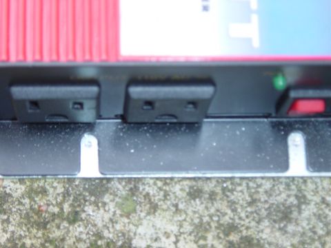 1988 Ford Bronco - I used a small drill bit and marked the spots I need to drill on the hinge to get the proper fit.